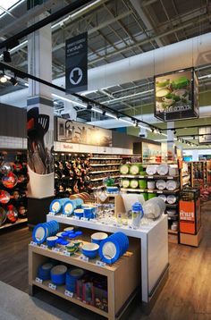 the inside of a store with many items on display