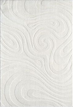 a white rug with wavy lines on it