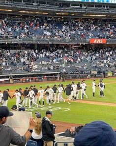 a baseball game in progress with the players on the field