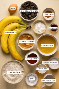 bananas, eggs, flour, and other ingredients are arranged on a table