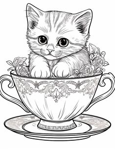 a kitten sitting in a teacup with roses