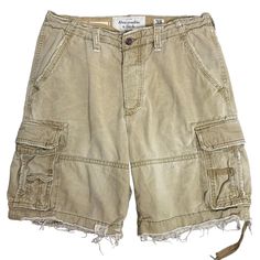 Vintage Y2K Abercrombie Cargo Shorts 32 Khaki Pockets Pockets Adjustable WaistGood conditionWear around the pockets and hemsWaist: 19" laying flatInseam: 10"Front rise: 12"100% CottonMade in Bangladesh Affordable Khaki Cargo Shorts, Cheap Beige Cotton Cargo Shorts, Cheap Khaki Cargo Shorts For Summer, Cheap Khaki Cargo Shorts, Cheap Khaki Cargo Shorts With Hip Pockets, Affordable Medium Wash Cargo Shorts, Cheap Casual Beige Cargo Shorts, Cheap Beige Cargo Shorts With Side Pockets, Cheap Khaki Cargo Shorts For Spring