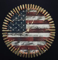 *** New model, with new personalization options! ***  This is my new favorite design of all time. Im calling it The Patriot. Like our other clocks, the hours are marked with .223 dummy rounds; the minutes are marked with 9mm dummy rounds. The clock face or dial is about 12 inches in Bullet Crafts, 50 Cal, Picture Wire, Gifts For Veterans, Patriotic Flag, Wooden Clock, Shell Crafts, Diy Bathroom, Diy Wood Projects