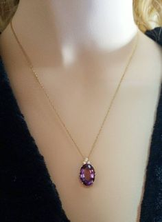 This is a beautiful pendant! 14K yellow gold amethyst and diamond pendant. It has a prominent purple amethyst stone below three elegant diamonds. The chain is 18-inches long. Oval Amethyst Pendant, Oval Stone Pendant, 14k Gold Oval Necklace In Purple, Quince Necklace, Clawdeen Costume, Pendant Bail, Amethyst Necklace Pendant, Casual Nails, Gold Chain With Pendant