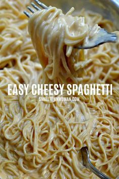 a fork full of noodles with the words easy cheesy spaghetti on it in white overlay