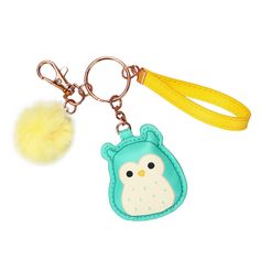 a keychain with an owl on it and a pom - pom