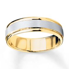 two tone gold and silver wedding ring with white stripes on the outside, set in 18k yellow gold