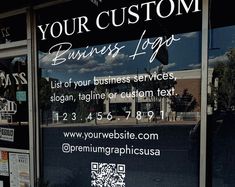 a business sign is displayed in the window of a storefront with an ad for your custom business logos