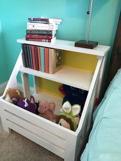 a white book shelf with stuffed animals in it