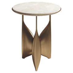 a round table with two curved legs and a white marble top on an isolated pedestal