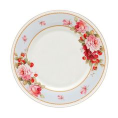 a white plate with pink flowers and gold trimmings on the rim, against a white background