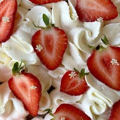 strawberries and whipped cream arranged on top of each other