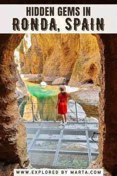 a person standing on a bridge over water with text that reads hidden gems in ronda, spain