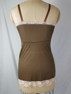 Good vintage condition Nylon At time of listing, two available. Marked 32 Bust 32 Waist 26 Hip 36 Length 22 Brown with light pink lace Vintage Fitted Tank Top With Spaghetti Straps, Fitted Vintage Tank Top With Spaghetti Straps, Stretch Lace Camisole With Straps, Fitted Lace Tank Top For Daywear, Fitted Vintage Camisole, Fitted Coquette Camisole Tank Top, Fitted Brown Camisole With Built-in Bra, Fitted Brown Top With Lace Trim, Beige Lace Camisole With Lace Top Detail