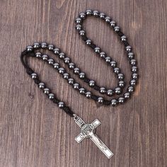 Material: 10mm hematite, paracord Cross size: 65mm*35mm    Enhance your prayer experience with this Vintage Style Solid and Durable Heavy Duty Catholic Rosary Necklace for Men. Crafted with striking Hematite beads, this exquisite piece is both stylish and meaningful. The sturdy construction ensures long-lasting wear, making it a perfect accessory for daily devotionals or special occasions. Add a touch of tradition and elegance to your wardrobe with this timeless Catholic rosary necklace. Paracord Cross, Rosary Beads Catholic, Catholic Rosary, Necklace Men, Rosary Necklace, Rosary Catholic, Rosary Beads, Hematite Beads, Paracord