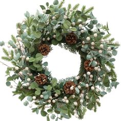 a wreath with pine cones and greenery