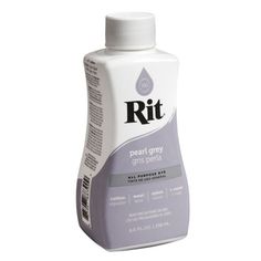 a bottle of rtt toothpaste on a white background