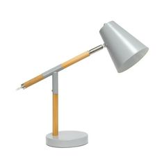 a desk lamp with a wooden stick on the top and a metal base, in front of a white background