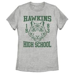 You may prefer a Demogorgon as your school mascot… but a tiger will do if you can also have an officially licensed Stranger Things Women's Graphic T-Shirt! Hawkins High School from the popular Netflix series is celebrated on this tee that shows off "1983" and a tiger mascot across the front. Enjoy comfort and fashion at the same time with this unique Women's graphic T Shirt from Stranger Things. Strut your stuff with this stylish new Women's Tee Shirt that is perfect for every occasion! Find the perfect fit for you! Check out size charts for more information. Made from the highest quality materials on first-class digital direct-to-garment printers. *This item is made to order please consider this when ordering multiple sizes.* Printed In the U.S.A with safe water-based inks. Easy care; mac Hawkins High School, Stranger Things Style, Tiger Graphic, Slim Fit Shorts, Gray Tshirt, Stranger Things, Graphic Tee, High School, Graphic Tees