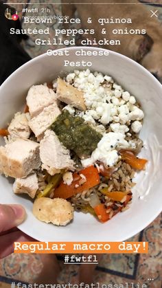 a person holding a white bowl filled with food