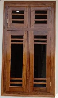 an image of wooden windows on the wall