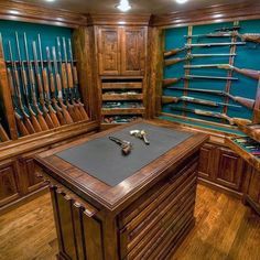 hunters-wood-cabinet-traditional-custom-gun-room Reloading Room, Hunting Room, Trophy Rooms, Hidden Rooms, Wood Cabinet, Modern Shelving, Secret Rooms, Custom Homes