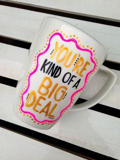 a coffee cup with the words you're kind of a big deal on it