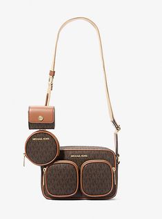 Keep your travel and tech essentials safe on the go with our Jet Set crossbody bag. Crafted from logo-print canvas, it’s equipped with multiple pockets and includes both a removable zip pouch and an Airpods Pro headphones® case. Wear the jacquard strap over your shoulder, or across the body on days when you need to go hands-free. Headphones Case, Tech Essentials, Apple Airpods Pro, Perfect Purse, Medium Sized Bags, Michael Kors Crossbody Bag, Michael Kors Outlet, Shoulder Strap Bag, Michael Kors Crossbody