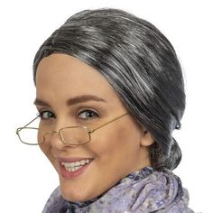 Skeleteen Old Lady Costume Set is the perfect accessories set for granny costumes. It is a favorite among kids and adults and can be worn on Halloween, Christmas or for every day dress up. The set includes a gray librarian style wig with a bun in the back that can be used to portray an old lady, Mrs. Clause, or a librarian. The glasses that are included in the set are non-prescription and small. The frames are of Victorian style and were used to portray influential people of the times. This set Granny Costume, Granny Wig, Old Lady Dress, Grandma Costume, Grey Hair Wig, Old Lady Costume, Librarian Style, Old Lady Humor, Rectangle Eyeglasses