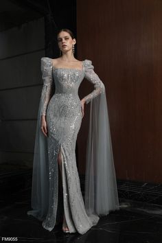 Indulge in elegance with the Azzure Couture FM9055 evening dress from the Spring 2024 Collection. Elevate your style with sheer sophistication. Engagement Dress For Bride, Silver Gown, Plastic Dress, Gaun Fashion, Evening Gowns Elegant, Black Bridesmaid Dresses, Engagement Dresses, فستان سهرة, Fantasy Dress