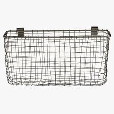 a metal wire basket with two handles