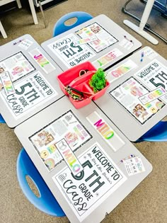 a table with several pieces of newspaper on it