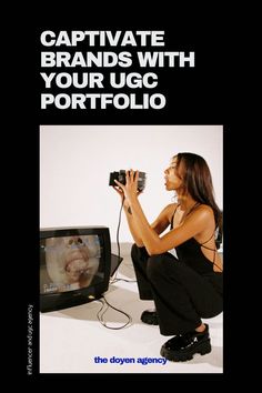 a woman kneeling down with a camera in front of a tv and the words captivate brands with your ugg portfolio