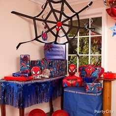 a spiderman themed birthday party with decorations