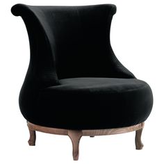 an upholstered black chair with wooden legs and curved back, on a white background