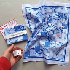 Board Game Board Design, Snake Ladder, Snakes Ladders, Handkerchief Design, White Handkerchief, Snake Game, Sore Loser, Coconut Bowls, Snakes And Ladders