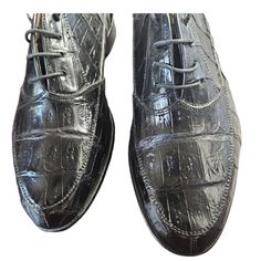 Elevate Your Formal Attire With These Stunning Belvedere Crocodile Dress Shoes. These Black Leather Oxfords Are Handcrafted In Italy And Designed With An Almond Toe Shape, Lace-Up Closure, And Solid Pattern. The Leather Lining And Insole Provide Comfort And Durability, While The Leather Outsole Adds A Touch Of Elegance. Item Is In Excellent Pre-Owned Condition See Pictures For Details. These Shoes Are Perfect For Any Occasion, Whether You're Attending A Business Meeting Or A Formal Event. The Un City Theme, Black Leather Oxfords, Crocodile Pattern, Crocodile Skin, Business Meeting, Formal Attire, Solid Pattern, Formal Event, Leather Shoes