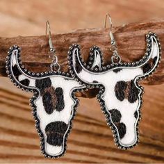 Silvertone & Cow-Print Longhorn Drop Earrings Add A Boho Touch To Your Wardrobe With This Set Of Earrings Featuring A Cow-Themed Drop Design. Brass-Plated Rhodium / Polyurethane Leather 1.5'' W X 2'' L Cowgirl, Cowboy, Boho, Western, Southwest, Yellowstone, Festival, Vacation, Country, Line Dancing, Party, Steer, Cow, Leopard, Stud, Dangle, Drop, Cute Earrings Cowgirl Jewelry Earrings, Western Cow Earrings, Country Earrings, Western Fashion Jewelry, Southern Jewelry, Cow Stuff, Country Jewelry, Cowgirl Bling, Bull Head