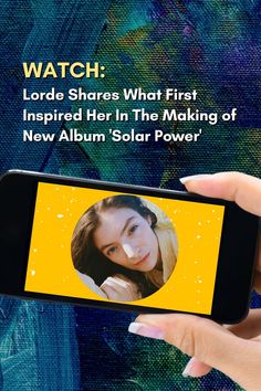 a person holding up a cell phone with the text watch lord shares what first, inspired her in the making of new album solar power