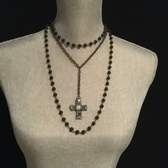 "❤️❤️❤️ On Sale 20% off and Free Shipping ❤️❤️❤️ Layered cross necklace set available in black, gray or white rosary chain. Unique gothic cross pendant has a gunmetal finish with a large crystal stone. Shortest length is 16\" - extends to 19\" with extender chain Materials: agate, lava bead, copper, Gunmetal plated steel This is a great mixture of texture and color with a boho or medieval look. - Mindful, spiritual and trendy jewelry for women - Beautifully packaged in a complimentary brocade si White Rosary, Layered Cross Necklace, Rosary Chain Necklace, Rustic Cross, Gothic Cross, Silk Jewelry, Lava Beads, Layered Necklace Set, Alexandria Va