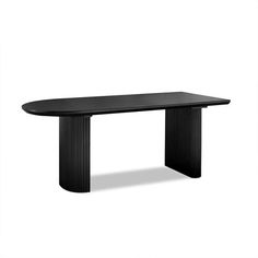 a black table sitting on top of a white floor