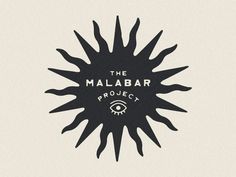 a black and white logo with the words the malabr project on it's side