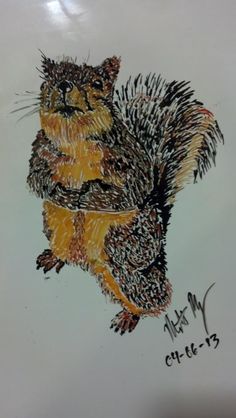 a drawing of a squirrel on a piece of paper