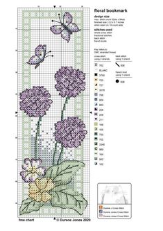 a cross stitch pattern with purple flowers and butterflies on the side, in front of a white