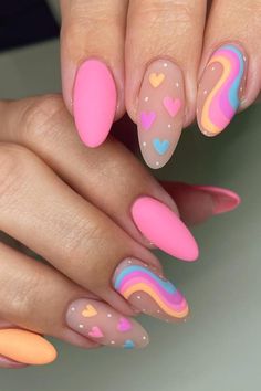 Get ready to fall in love with these Playful Pastel Almond Nails! With a rainbow swirl of colors and darling heart accents, this manicure is a delightful mix of sweet and sophisticated. Click through to see more of these whimsical nails and be inspired to try them for yourself! // Photo Credit: Instagram @nail.brat Retro Nail Ideas, Retro Nail Art Vintage, Easter Egg Nails, College Nails, Birthday Nail Designs, Pastel Nail Art, Easter Nail, Easter Nail Designs, Celebrity Nails