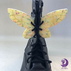 "Yellow confetti \"birthday cake\" resin butterfly wings to decorate shoes, boots or skates. They are removable and lightweight. They are about 2\" wide and 2.5\" tall. Please note this is a handmade item and as such will have minor imperfections. Due to differences in screen settings, lighting and backgrounds colors may differ slightly. Resin is sensitive to extreme heat so avoid placing in direct sunlight or a high temperature setting as this may cause the resin to soften. Resin will yellow ov Diy Butterfly Shoes, Bee Themed Boots Fantady, Butterfly Wing Boots, Butterfly Platforms, Confetti Birthday Cake, Wings Decoration, Wings Shoes, Shoe Wings, Decorate Shoes