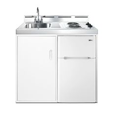 a white kitchen sink sitting next to a refrigerator