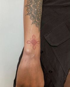 a person with a tattoo on their arm