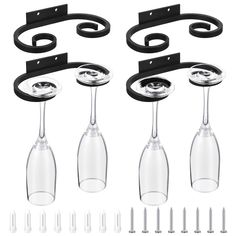 three glass hooks and two hooks with screws on each end, all in black