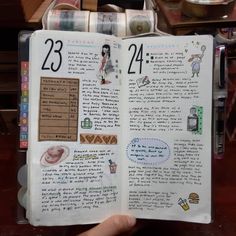 an open book with stickers on the pages and numbers in each section that are labeled